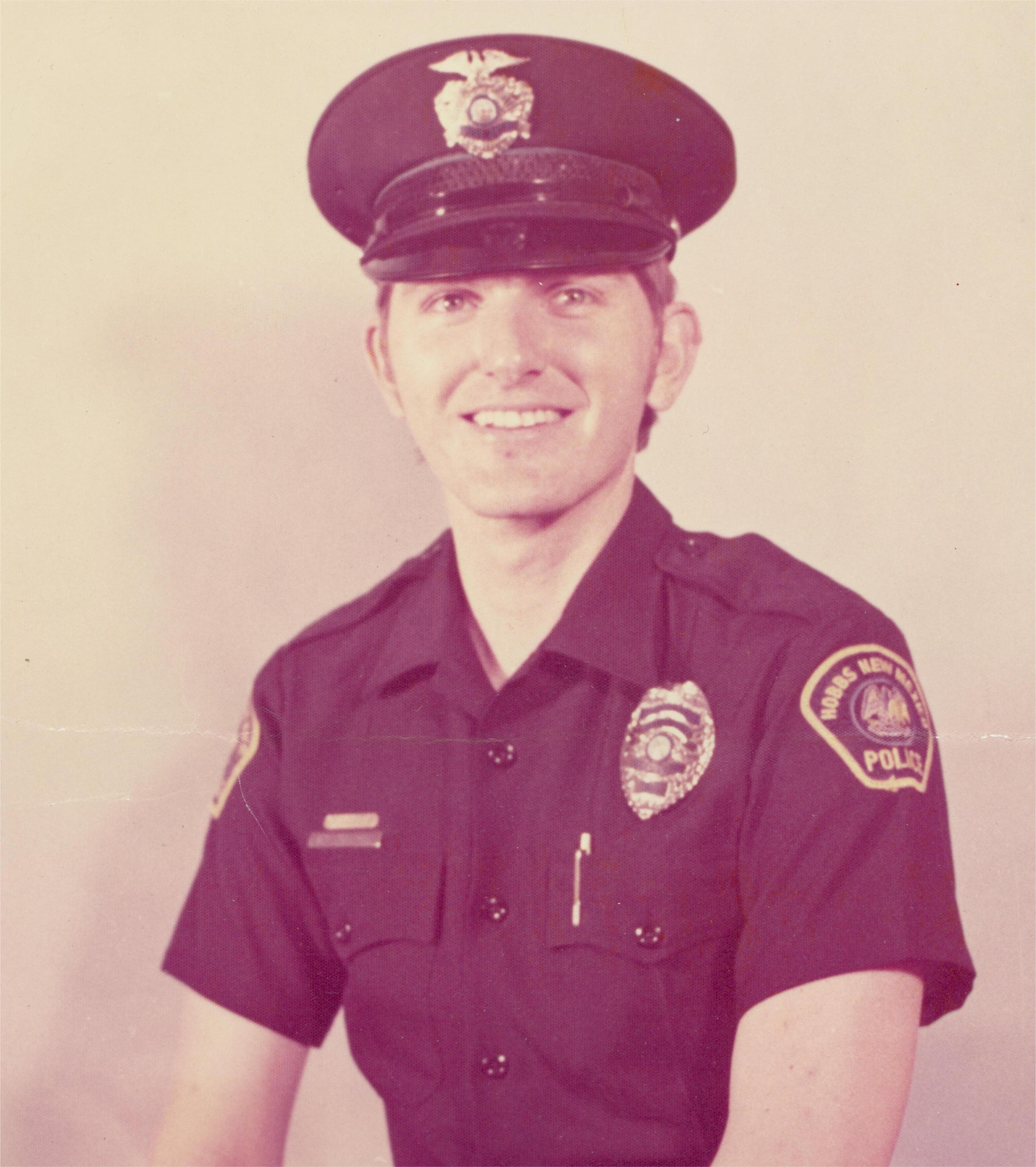 Vintage police officer portrait from AADI's family history